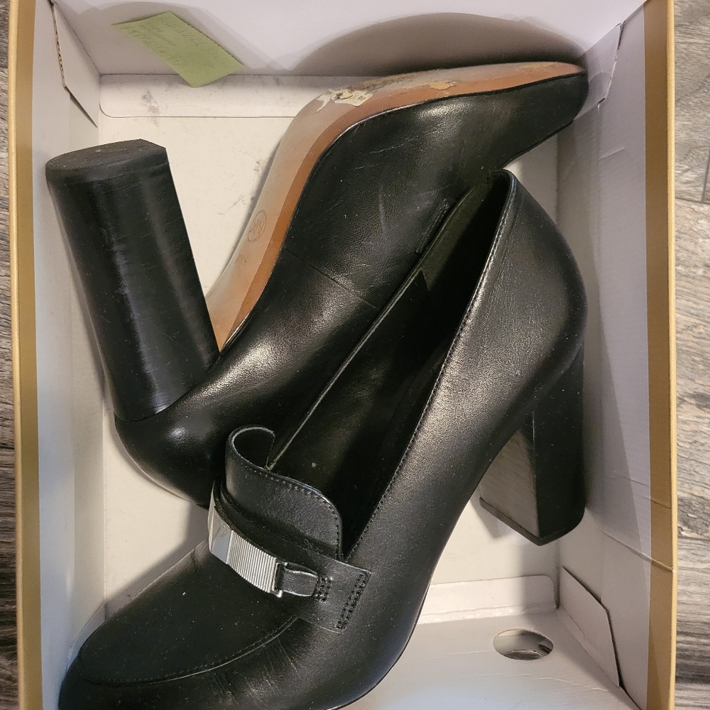 Black patent leather Michael Kors 3" heels. Rarely worn. Size 6.5M
